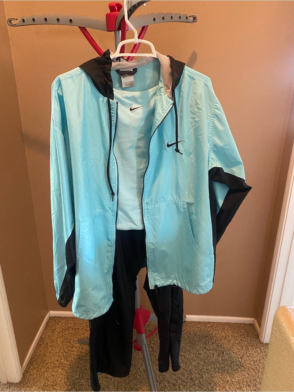 Nike Women’s Aqua and Black Hooded Windbreaker Jacket